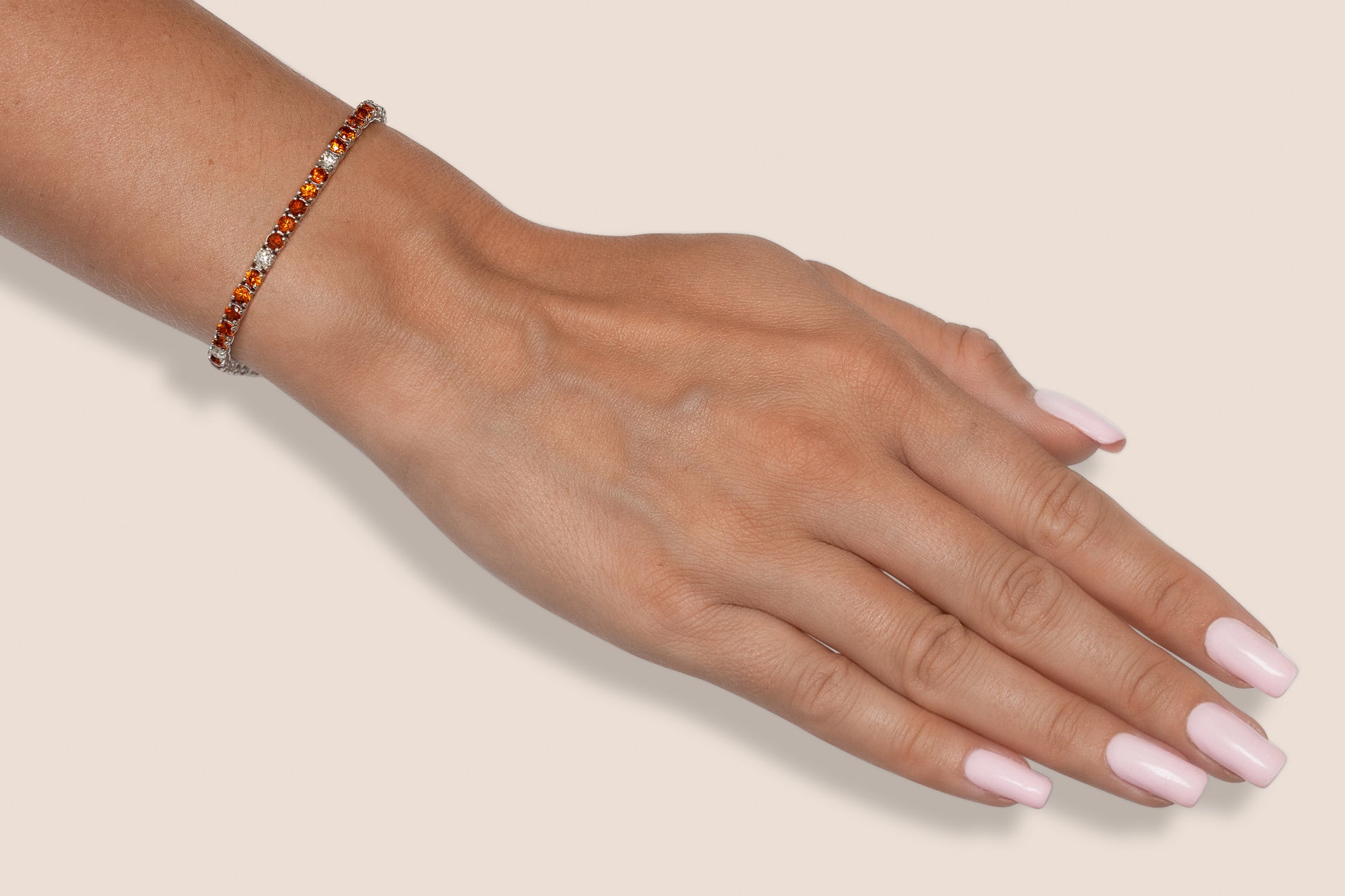 18K White Gold Diamonds & Orange Sapphires Tennis Bracelet