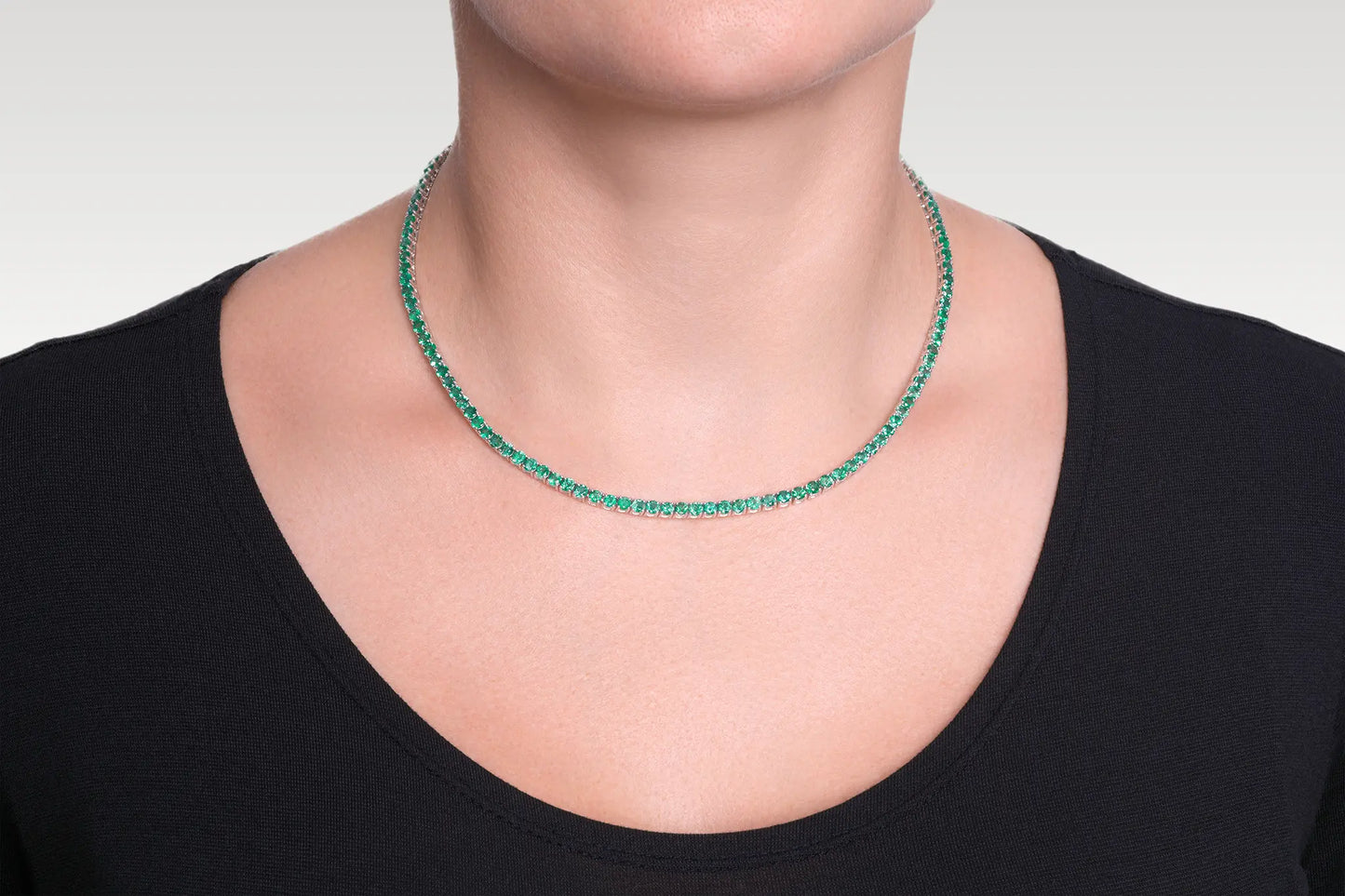 18K White Gold Green Emerald Tennis Necklace DTW. 12.22ct