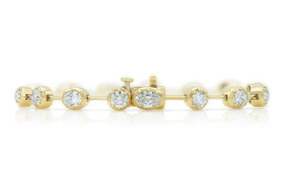 18K Yellow Gold Multi-shaped Diamond Bracelet Tw. 5.60 carat