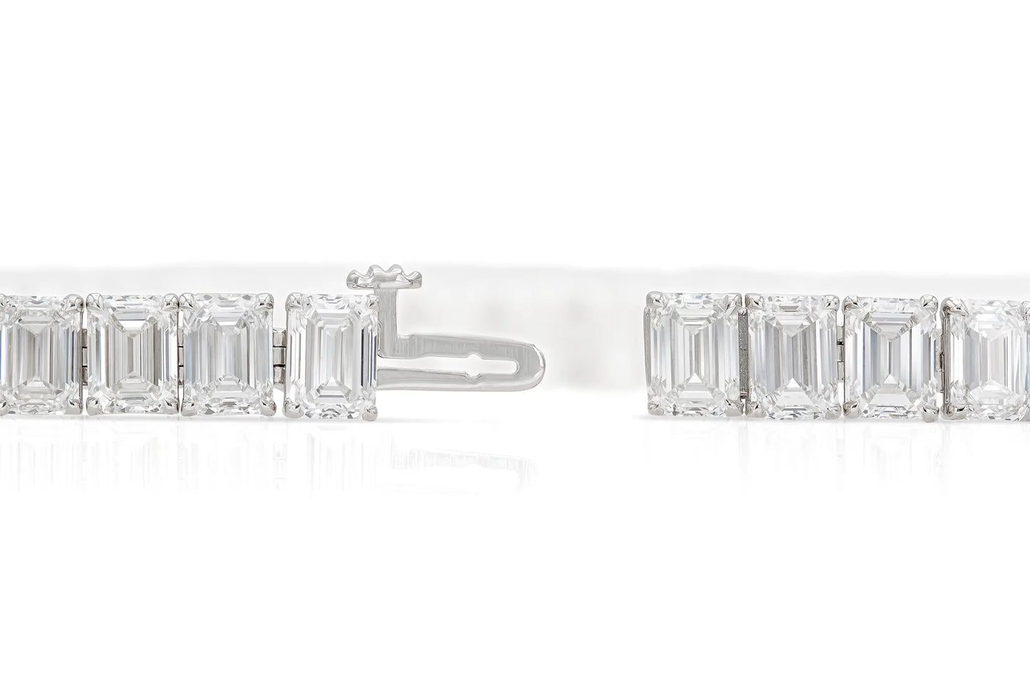 18K WG Emerald Cut Tennis Bracelet Tw. 30.48 carat